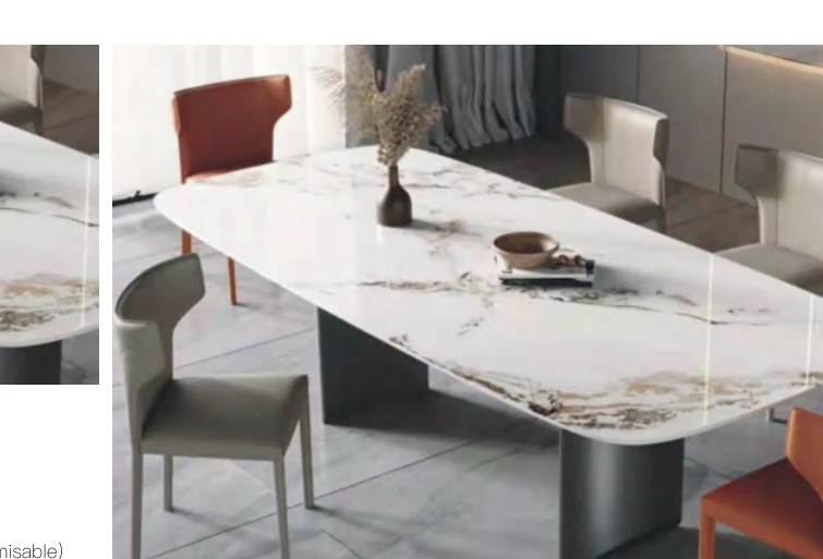 Rectangular stone-look dining table surrounded by six mixed dining chairs in a residential interior